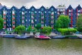 08-07-2019 amsterdam the netherlands shot of authentic amsterdam buildings next to the channel