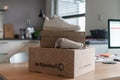 De Bijenkorf online package delivery, unboxing package, online shopping, fashion shoes, white sneakers, box on the table