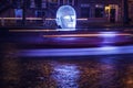 AMSTERDAM, NETHERLANDS - DECEMBER 19, 2015: Light installations on night canals of Amsterdam within light festival on December 19, Royalty Free Stock Photo