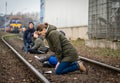 Christian climate activists blocking the rail tracks and praying during the protest action