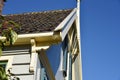 Amsterdam, Netherlands. February 2023. Ornaments of the wooden facades of houses in Broek in Waterland.