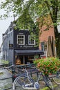 Amsterdam, Netherlands, 10/12/2019: House-restaurant on the water. Beautiful city landscape.