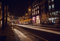 AMSTERDAM, NETHERLANDS - JANUARY 22 2016: City streets of Amsterdam at night. General views of city landscape on January 22, 2016 Royalty Free Stock Photo