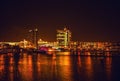 AMSTERDAM, NETHERLANDS - JANUARY 1, 2016: General view on night canal in center of Amsterdam from bridge near museum Nemo. On Jan Royalty Free Stock Photo