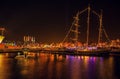 AMSTERDAM, NETHERLANDS - JANUARY 1, 2016: General view on night canal in center of Amsterdam from bridge near museum Nemo. On Jan