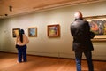 Amsterdam, Netherlands. January 2023. Visitors admire paintings by Vincent van Gogh in Amsterdam. Royalty Free Stock Photo