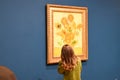 Amsterdam, Netherlands. January 2023. Visitors admire paintings by Vincent van Gogh in Amsterdam. Royalty Free Stock Photo