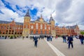 Amsterdam, Netherlands - July 10, 2015: Central station as seen from outside plaza, beautiful traditional European