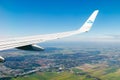 Amsterdam, Netherlands - 7 July 2021: KLM Plain wing over Holland. Flight from Helsinki to Amsterdam