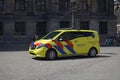 AMSTERDAM, NETHERLANDS - JULY 16, 2022: Modern ambulance vehicle on city street