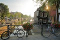 Sint Antoniesluis lock, overlooking Oudeschans canal, with a crooked heritage building cafe de Sluyswacht