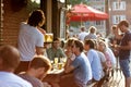 Amsterdam, Netherlands. July 19, 2017. Young people hanging out in summer cafe