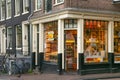 AMSTERDAM, NETHERLANDS - JUNE 25, 2017: Entrance to the Cheese Deli shop on the Oudezijds Voorburgwal street.