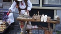 Amsterdam, Netherlands - June 14, 2017: The handicraftsman produces traditional wooden footwear klomp on the street of