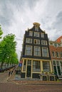 Amsterdam old house on the corner of narrow street Royalty Free Stock Photo