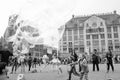 Soap bubbles on the street in Dam Square in Amsterdam Royalty Free Stock Photo