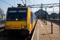 Amsterdam, Netherlands, march 2022. Dutch train in the landscape and in the central station