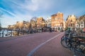 Amsterdam, Netherlands - 2020 March 18 : Empty Amsterdam downtown streets without people, closed restaurants and stores