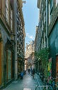 AMSTERDAM, NETHERLANDS - March 20, 2018 : narrow streets of Amsterdam at sunny spring day. Royalty Free Stock Photo