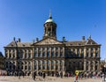 AMSTERDAM, NETHERLANDS - March 20, 2018 : Royal Palace Amsterdam at sunny spring day. Royalty Free Stock Photo