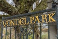 Gold letters Vondelpark on the park fence, Amsterdam Royalty Free Stock Photo