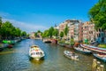 Canal cruise boat in Amsterdam Royalty Free Stock Photo