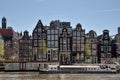 Amsterdam, Netherlands, May 2022. The dancing houses and the house boats at the Amstel river in Amsterdam Royalty Free Stock Photo