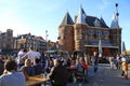 People in outdoor cafe on Nieuwmarkt New Market square in cent