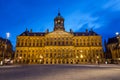 Amsterdam, Netherlands - May 7, 2015: People visit Royal Palace at Dam Square in Amsterdam.