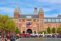 Amsterdam, Netherlands - May, 2018: Rijksmuseum Amsterdam museum with words I Amsterdam and tourists. Famous landmark in Netherlan Royalty Free Stock Photo