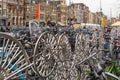 Amsterdam, Netherlands - November 28, 2019: Bicycles park on street. Amsterdam is the most bicycle-friendly capital city in the