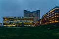 Busy Office Buildings During Night In Amsterdam City Royalty Free Stock Photo