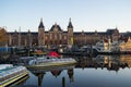 House boats and tourist boats along Signel canal during an early autumn fall morning Royalty Free Stock Photo