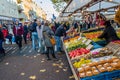 People visiting the Albert Cuyp Market, a street market and tourist attraction in Amsterdam, the Netherlands Royalty Free Stock Photo
