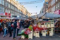 People visiting the Albert Cuyp Market, a street market and tourist attraction in Amsterdam, the Netherlands Royalty Free Stock Photo