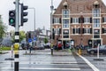 Amsterdam, Netherlands, 10/10/2019: Pedestrian crossing with traffic lights in the city