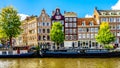 The Prinsengracht Prince Canal at the Leliegracht Lelie Canal with its many historic houses in the center of Amsterdam