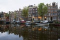 Cloudy September morning on the city canal. Amsterdam Royalty Free Stock Photo