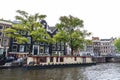 Houseboat along of a canal in Amsterdam, Netherlands