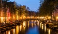 Amsterdam. Night view of Amsterdam cityscape with canal, bridge and typical Dutch Houses Royalty Free Stock Photo