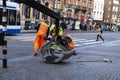 Workers asphalting a street in Amsterdam, Netherlands