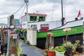 Amsterdam, Netherlands, 10/11/2019: Ship-hotel on the pier decorated with flowers. Nice view on a cloudy day