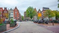 Amsterdam, Netherlands - 14.10.2019: Typical Amsterdam scene with colored buildings, canals, bridges and bicycles Royalty Free Stock Photo