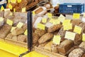 Amsterdam, Netherlands, 10/12/2019: A variety of bread with price tags on the counter Royalty Free Stock Photo