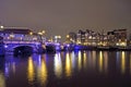 Amsterdam by night with the Blue Bridge at the Amstel in the Net Royalty Free Stock Photo