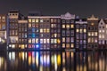 Amsterdam. Night view of Amsterdam cityscape with canal, bridge and typical Dutch Houses. Netherlands Royalty Free Stock Photo