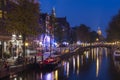 Amsterdam. Night view of Amsterdam cityscape with canal, bridge and typical Dutch Houses. Netherlands Royalty Free Stock Photo