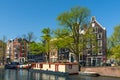 Typical Amsterdam houses along the canal, living boats, Holland Netherlands Europe Royalty Free Stock Photo