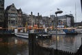 Amsterdam old bridge over river Amstel canal. Royalty Free Stock Photo