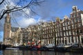 Amsterdam old bridge over river Amstel canal. Royalty Free Stock Photo